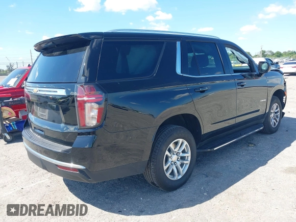 2023 Chevrolet Tahoe LS z VIN 1GNSCMKD9PR282840, wystawiony jako IAAI lot #41904280 z przebiegiem 73 298 mil mil oraz . Historia ofert i sprzedaży dostępna na DreamBid. Obrazek 4.