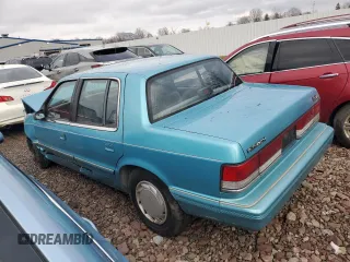 1992 Plymouth Acclaim z VIN 1P3XA4631NF248220, wystawiony jako Copart lot #84113754 z przebiegiem 117 489 mil mil oraz Szkody całkowita. Historia ofert i sprzedaży dostępna na DreamBid. Obrazek 2.