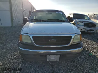 2004 Ford F-150 Heritage XL with VIN 2FTRX17W44CA46304, listed as a Copart auction lot 49446765 with 308,131 mi miles and Salvage Title. Bid and sale history available at carsss.com. Image 5.
