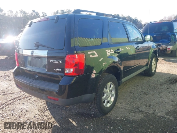 2010 Mazda Tribute Sport with VIN 4F2CY9C74AKM03679, listed as a IAAI auction lot 41740156 with 142,208 mi miles and . Bid and sale history available at DreamBid. Image 4.