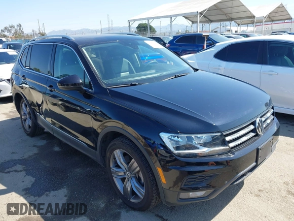2021 Volkswagen Tiguan SE with VIN 3VV3B7AX1MM045478, listed as a IAAI auction lot 41947899 with 56,694 mi miles and . Bid and sale history available at DreamBid. Image 1.