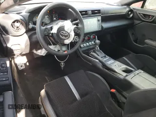 2023 Toyota GR86 Premium with VIN JF1ZNBF12P8765815, listed as a Copart auction lot 69377494 with 5,382 mi miles and Salvage Title. Bid and sale history available at carsss.com. Image 8.
