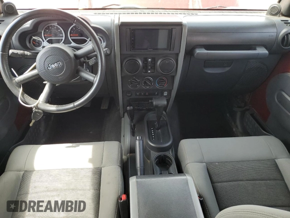 2010 Jeep Wrangler Unlimited Rubicon with VIN 1J4BA6H14AL115460, listed as a Copart auction lot 58349925 with Not provided miles and Salvage title. Bid and sale history available at DreamBid. Image 8.