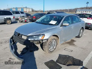 2014 Volkswagen Passat S w/Nav with VIN 1VWAP7A35EC052552, listed as a IAAI auction lot 41377109 with 123,273 mi miles. Bid and sale history available at carsss.com. Image 2.
