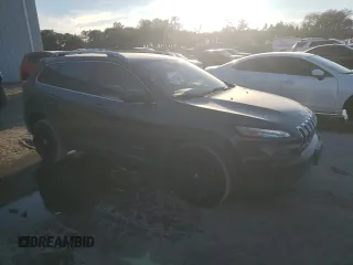 2017 Jeep Cherokee Latitude with VIN 1C4PJLCB8HW660774, listed as a Copart auction lot 41416015 with 112,360 mi miles and Salvage Title. Bid and sale history available at carsss.com. Image 4.