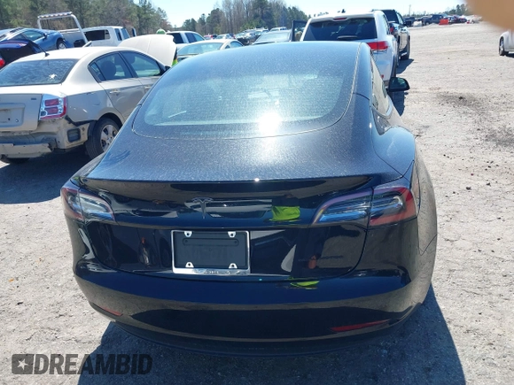 2022 Tesla Model 3 Long Range with VIN 5YJ3E1EB3NF104313, listed as a IAAI auction lot 41832803 with 39,061 mi miles and . Bid and sale history available at DreamBid. Image 16.