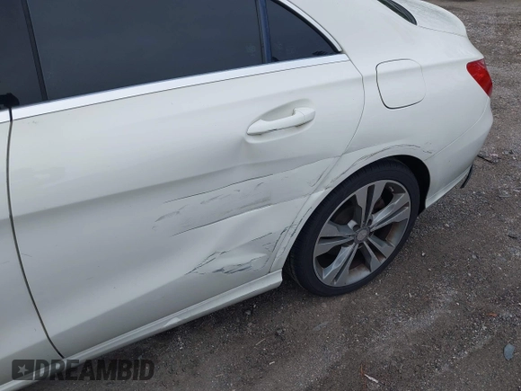 2014 Mercedes-Benz CLA 250 with VIN WDDSJ4EBXEN052730, listed as a IAAI auction lot 42653232 with 152,303 mi miles and . Bid and sale history available at DreamBid. Image 6.
