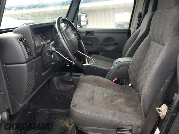 2003 Jeep Wrangler Sport with VIN 1J4FA49S43P321998, listed as a Copart auction lot 60860444 with 109,856 mi miles and Salvage Title. Bid and sale history available at carsss.com. Image 7.