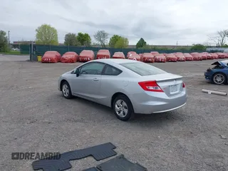 2013 Honda Civic Cpe LX with VIN 2HGFG3B58DH519509, listed as a IAAI auction lot 42056018 with 80,453 mi miles. Bid and sale history available at carsss.com. Image 3.