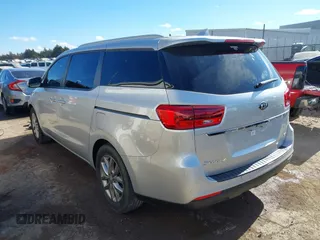 2021 Kia Sedona EX with VIN KNDMB5C11M6664811, listed as a IAAI auction lot 41390328 with 128,568 mi miles. Bid and sale history available at carsss.com. Image 3.