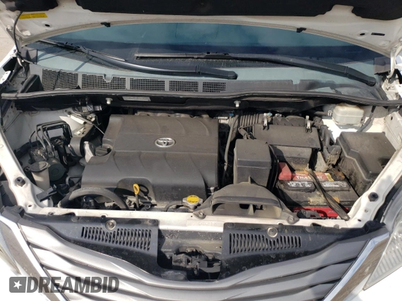 2012 Toyota Sienna XLE AAS with VIN 5TDYK3DC0CS250830, listed as a Copart auction lot 73323284 with 147,580 mi miles and Salvage Title. Bid and sale history available at DreamBid. Image 13.