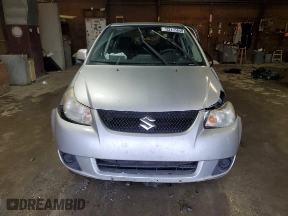 2010 Suzuki SX4 with VIN JS2YC5A49A6310256, listed as a Copart auction lot 73210584 with 135,021 mi miles and Salvage Title. Bid and sale history available at DreamBid. Image 5.