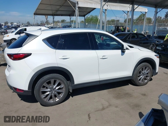 2020 Mazda CX-5 Grand Touring with VIN JM3KFADM0L1838495, listed as a IAAI auction lot 41991566 with 32,021 mi miles. Bid and sale history available at carsss.com. Image 13.