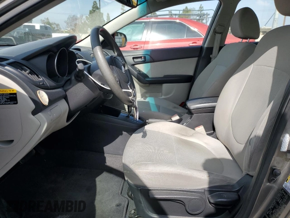 2010 Kia Forte EX z VIN KNAFU4A27A5260564, wystawiony jako Copart lot #55440345 z przebiegiem 169 444 mil mil oraz Szkoda całkowita • Salvage title. Historia ofert i sprzedaży dostępna na DreamBid. Obrazek 7.
