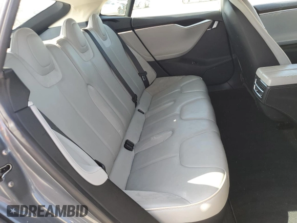 2014 Tesla Model S 60 с VIN 5YJSA1H15EFP49412, выставлен на аукционе Copart как лот 60476835 с пробегом 96 202 миль миль и Списание • Salvage title. История ставок и продаж доступна на DreamBid. Изображение 10.