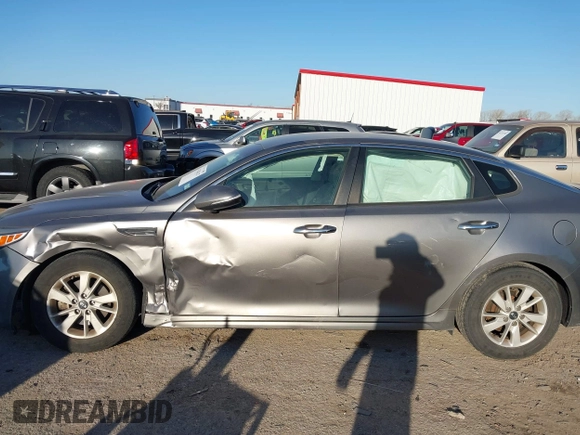 2016 Kia Optima LX with VIN 5XXGT4L39GG102599, listed as a IAAI auction lot 41748147 with 104,712 mi miles. Bid and sale history available at carsss.com. Image 14.