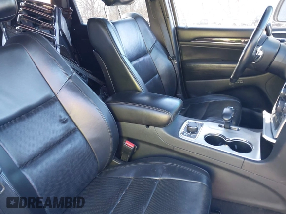 2015 Jeep Grand Cherokee Overland with VIN 1C4RJFCGXFC215750, listed as a IAAI auction lot 40795135 with 89,110 mi miles and . Bid and sale history available at DreamBid. Image 8.