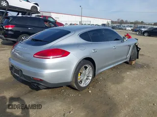 2015 Porsche Panamera 4S z VIN WP0AB2A70FL050779, wystawiony jako IAAI lot #40977292 z przebiegiem 78 574 mil mil oraz . Historia ofert i sprzedaży dostępna na DreamBid. Obrazek 4.