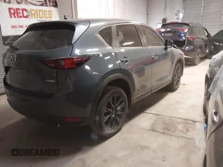 2021 Mazda CX-5 Touring with VIN JM3KFACM9M0379508, listed as a IAAI auction lot 41577251 with 46,519 mi miles. Bid and sale history available at carsss.com. Image 4.