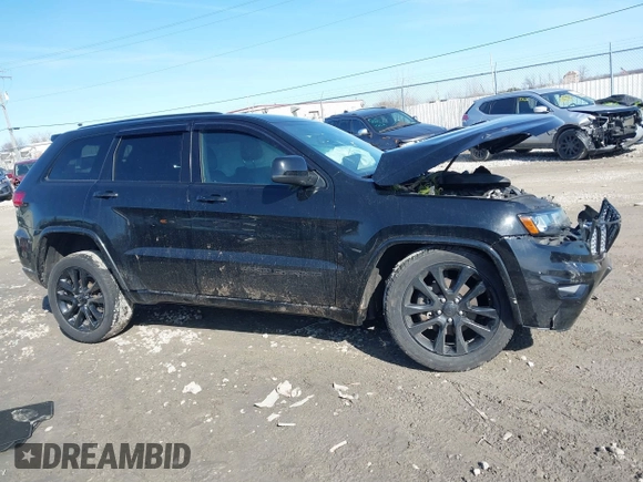 2019 Jeep Grand Cherokee Laredo E with VIN 1C4RJFAG6KC661777, listed as a IAAI auction lot 41762646 with 103,547 mi miles. Bid and sale history available at carsss.com. Image 13.