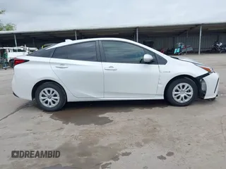 2022 Toyota Prius L Eco with VIN JTDKAMFUXN3157225, listed as a IAAI auction lot 39292379 with 59,333 mi miles and . Bid and sale history available at DreamBid. Image 14.