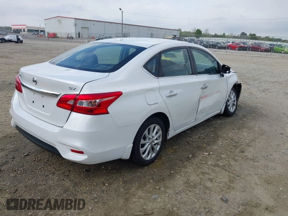 2018 Nissan Sentra S with VIN 3N1AB7AP2JY209169, listed as a IAAI auction lot 41942284 with 123,028 mi miles and . Bid and sale history available at DreamBid. Image 4.