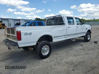 1997 Ford F-350 с VIN 1FTJW36F5VEA76761, выставлен на аукционе Copart как лот 56678865 с пробегом 156 329 миль миль и Чистый • Clean title. История ставок и продаж доступна на DreamBid. Изображение 3.