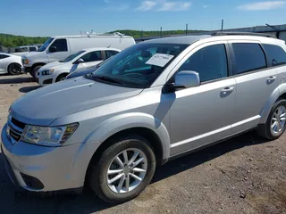 2014 Dodge Journey SXT with VIN 3C4PDCBG8ET118998, listed as a IAAI auction lot 42177885 with 165,247 mi miles. Bid and sale history available at carsss.com. Image 6.