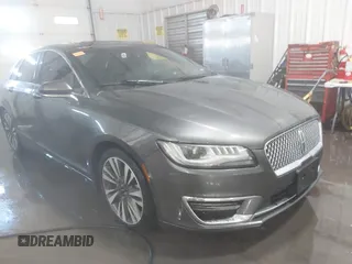 2017 Lincoln MKZ Hybrid Reserve z VIN 3LN6L5MU9HR637908, wystawiony jako IAAI lot #38541395 z przebiegiem 272 691 mil mil oraz . Historia ofert i sprzedaży dostępna na DreamBid. Obrazek 1.