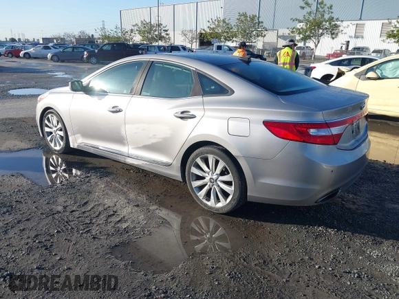 2013 Hyundai Azera z VIN KMHFH4JG3DA230844, wystawiony jako IAAI lot #41817997 z przebiegiem 129 163 mil mil oraz . Historia ofert i sprzedaży dostępna na DreamBid. Obrazek 3.