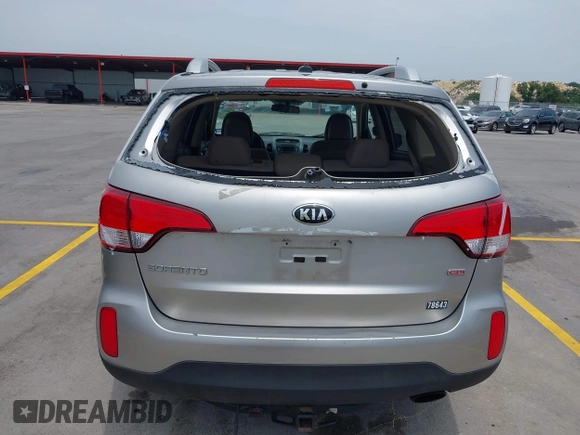 2014 Kia Sorento LX z VIN 5XYKT4A7XEG460996, wystawiony jako IAAI lot #42270696 z przebiegiem 105 677 mil mil oraz . Historia ofert i sprzedaży dostępna na DreamBid. Obrazek 13.