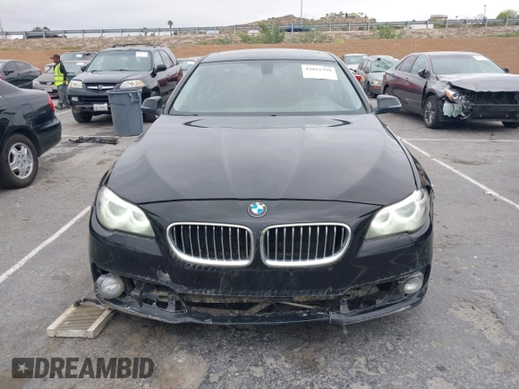 2015 BMW 5 Series 535i with VIN WBA5B1C55FD922761, listed as a IAAI auction lot 42021799 with 118,592 mi miles and . Bid and sale history available at carsss.com. Image 12.