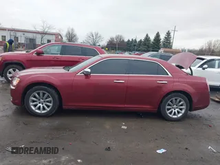2013 Chrysler 300 C with VIN 2C3CCAEG4DH698893, listed as a IAAI auction lot 41189845 with 153,638 mi miles and . Bid and sale history available at DreamBid. Image 14.