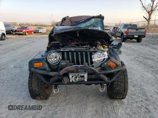 2005 Jeep Wrangler X with VIN 1J4FA39S75P308465, listed as a Copart auction lot 48693035 with Not Provided miles and Salvage Title. Bid and sale history available at DreamBid. Image 5.