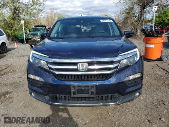 2017 Honda Pilot Touring with VIN 5FNYF6H94HB048329, listed as a Copart auction lot 53202735 with 140,453 mi miles and Salvage Title. Bid and sale history available at carsss.com. Image 5.
