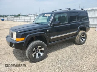 2009 Jeep Commander Limited with VIN 1J8HG58T19C555862, listed as a Copart auction lot 59569625 with 140,219 mi miles and Salvage title. Bid and sale history available at DreamBid. Image 1.