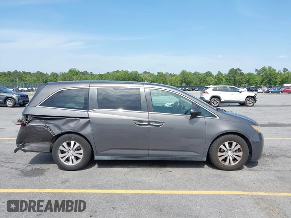 2015 Honda Odyssey EX z VIN 5FNRL5H41FB059667, wystawiony jako IAAI lot #42274039 z przebiegiem 196 687 mil mil oraz . Historia ofert i sprzedaży dostępna na DreamBid. Obrazek 13.