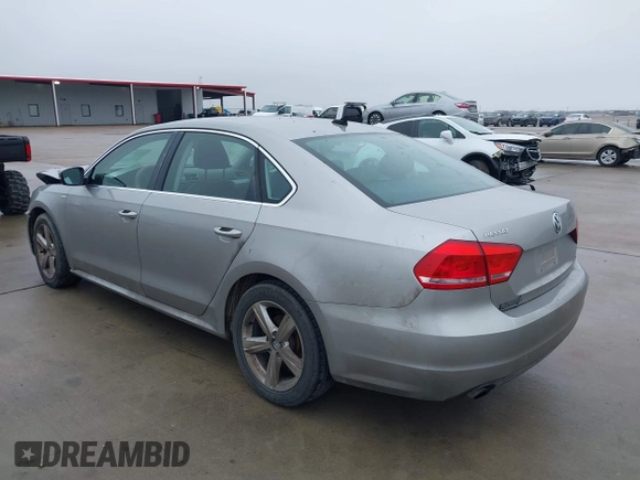 2014 Volkswagen Passat Wolfsburg Edition with VIN 1VWAT7A32EC028320, listed as a IAAI auction lot 41456457 with 173,581 mi miles and . Bid and sale history available at DreamBid. Image 3.