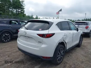 2018 Mazda CX-5 Grand Touring with VIN JM3KFBDM0J0308813, listed as a IAAI auction lot 42657978 with 78,119 mi miles and . Bid and sale history available at DreamBid. Image 4.
