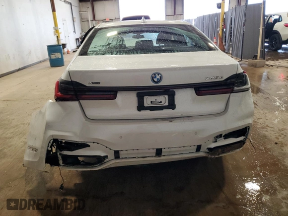 2022 BMW 7 Series with VIN WBA7W4C08NCH89469, listed as a Copart auction lot 54008785 with Not provided miles and Salvage title. Bid and sale history available at DreamBid. Image 6.