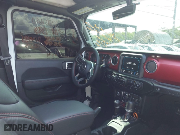 2022 Jeep Wrangler Unlimited Rubicon with VIN 1C4HJXFG8NW130156, listed as a IAAI auction lot 42004630 with 129,313 mi miles and . Bid and sale history available at DreamBid. Image 5.
