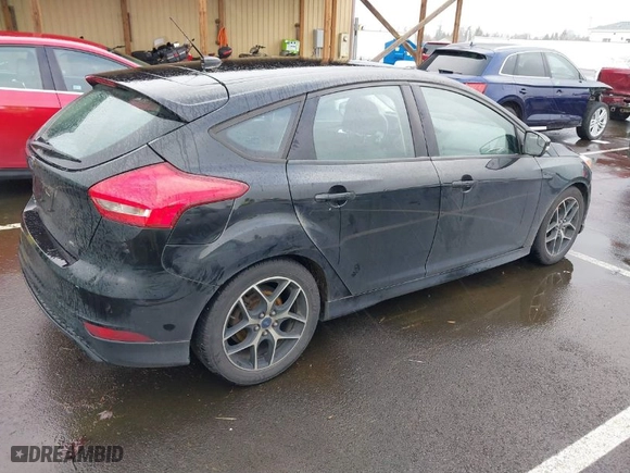 2015 Ford Focus SE with VIN 1FADP3K24FL370068, listed as a IAAI auction lot 41664236 with 328,569 mi miles. Bid and sale history available at carsss.com. Image 4.