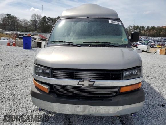 2004 Chevrolet Express Passenger z VIN 1GBFG15TX41155433, wystawiony jako Copart lot #48826455 z przebiegiem 327 969 mil mil oraz Szkoda całkowita • Salvage title. Historia ofert i sprzedaży dostępna na DreamBid. Obrazek 5.