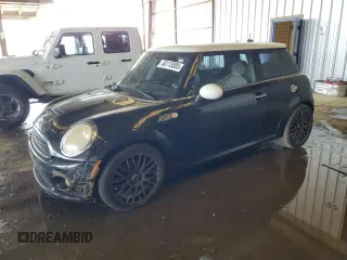 2010 MINI Hardtop S with VIN WMWMF7C56ATZ73929, listed as a Copart auction lot 46113505 with 123,038 mi miles and Clean Title. Bid and sale history available at DreamBid. Image 1.