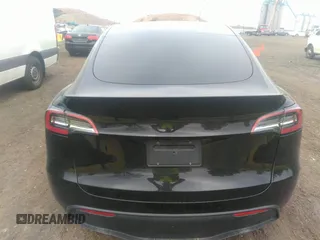 2022 Tesla Model Y Performance with VIN 7SAYGDEF6NF530388, listed as a IAAI auction lot 39253462 with 21,393 mi miles and . Bid and sale history available at DreamBid. Image 15.