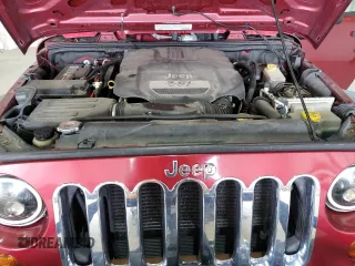2012 Jeep Wrangler Sport with VIN 1C4AJWAG5CL233049, listed as a Copart auction lot 52328865 with 185,388 mi miles and Salvage title. Bid and sale history available at DreamBid. Image 12.