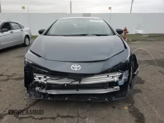 2024 Toyota Prius LE with VIN JTDACAAU4R3022601, listed as a Copart auction lot 82591044 with 9,798 mi miles and Salvage Title. Bid and sale history available at carsss.com. Image 5.