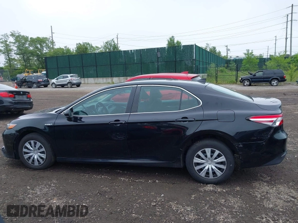 2019 Toyota Camry Hybrid LE z VIN 4T1B31HK5KU510055, wystawiony jako IAAI lot #42325522 z przebiegiem 97 000 mil mil oraz . Historia ofert i sprzedaży dostępna na DreamBid. Obrazek 14.