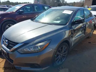 2018 Nissan Altima 2.5 S with VIN 1N4AL3AP6JC152220, listed as a IAAI auction lot 41591876 with 103,299 mi miles. Bid and sale history available at carsss.com. Image 2.