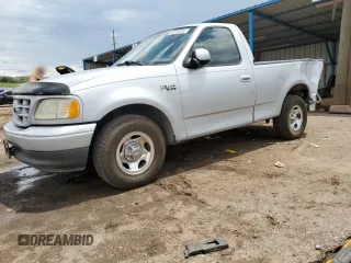 2002 Ford F-150 XL with VIN 1FTRF17242NB04340, listed as a Copart auction lot 58119345 with 218,734 mi miles and Non repairable. Bid and sale history available at DreamBid. Image 1.